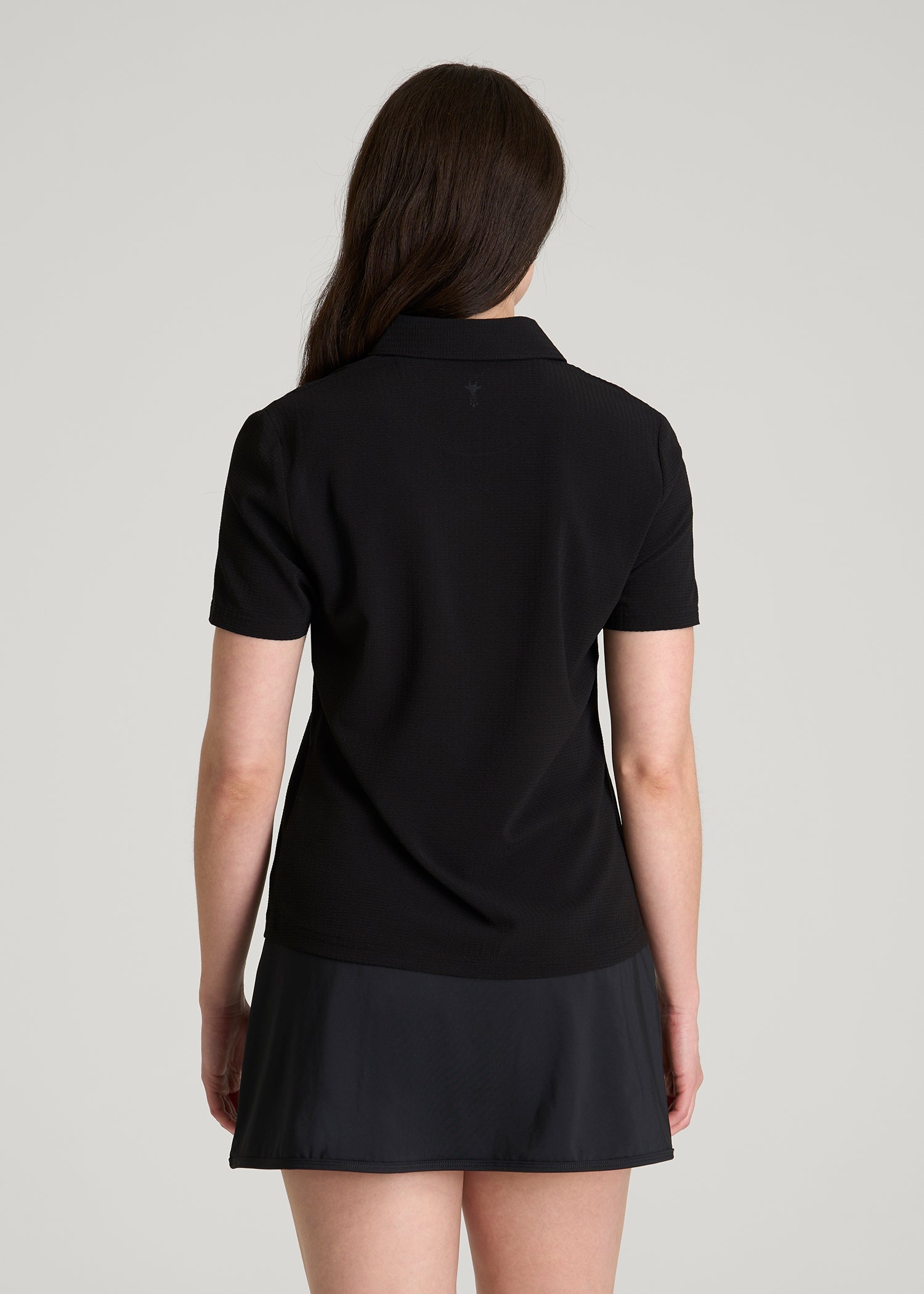 American Tall Outlet | Coastal perforated short sleeve golf polo for Tall Women in Black